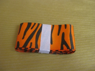 Лента репс оранжевая зебра 25 мм- R01405